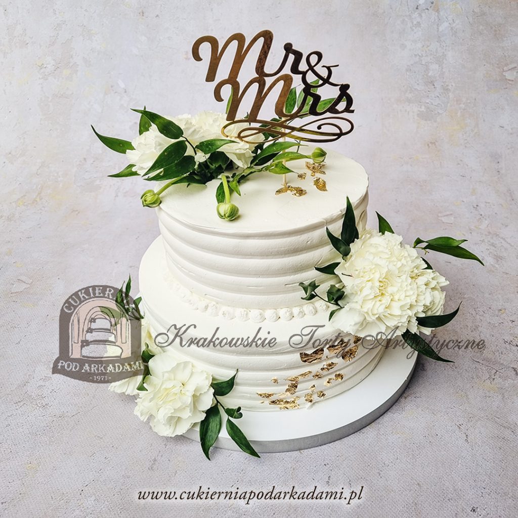 62BW Weselny tort piętrowy biały z jadalnym złotem zdobiony kwiatami i topperem cpa
